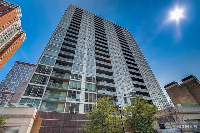 Property Photo: 20 Newport Parkway 1211 NJ 07310
