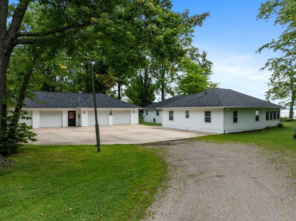 Property Photo:  3230 W Burt Lake Road  MI 49716 