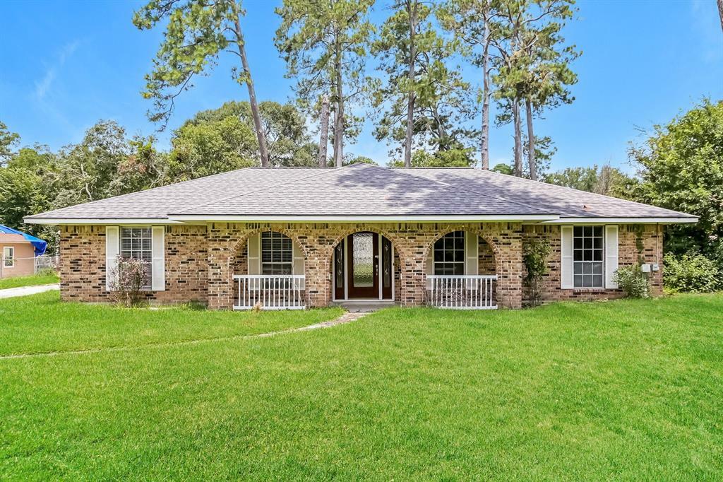 Property Photo:  818 Coe Road  TX 77362 