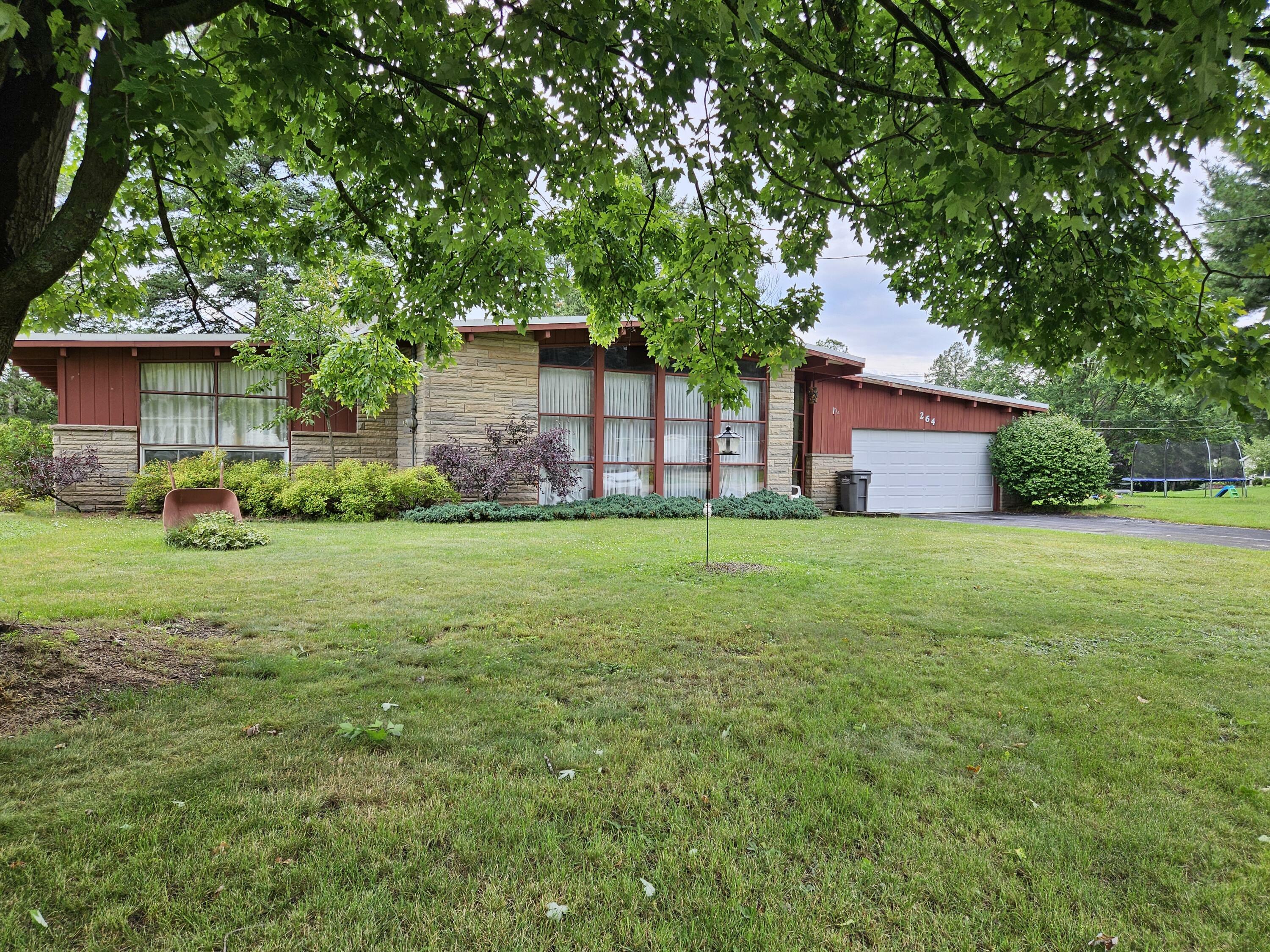 Property Photo:  264 Thelma Drive Drive  MI 49014 