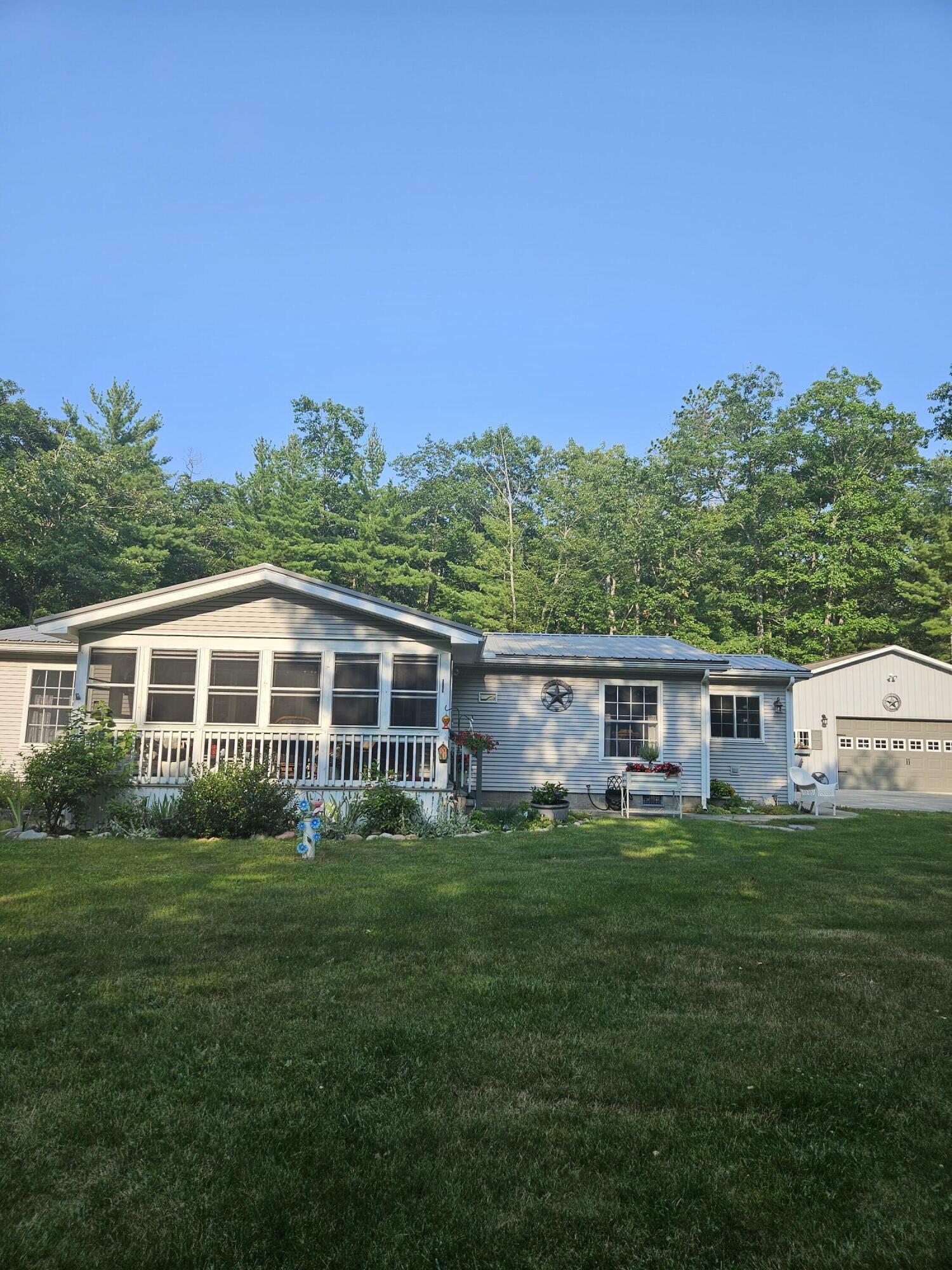 Property Photo:  6847 Chippewa Trail  MI 49779 