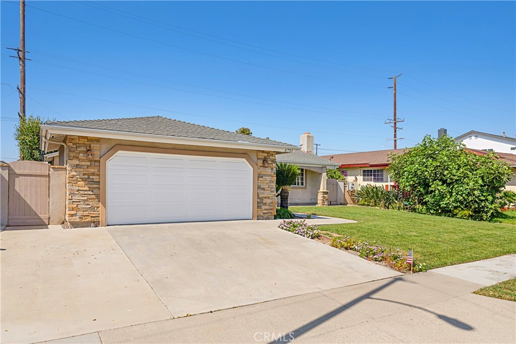 Property Photo:  6751 Walton Drive  CA 92647 