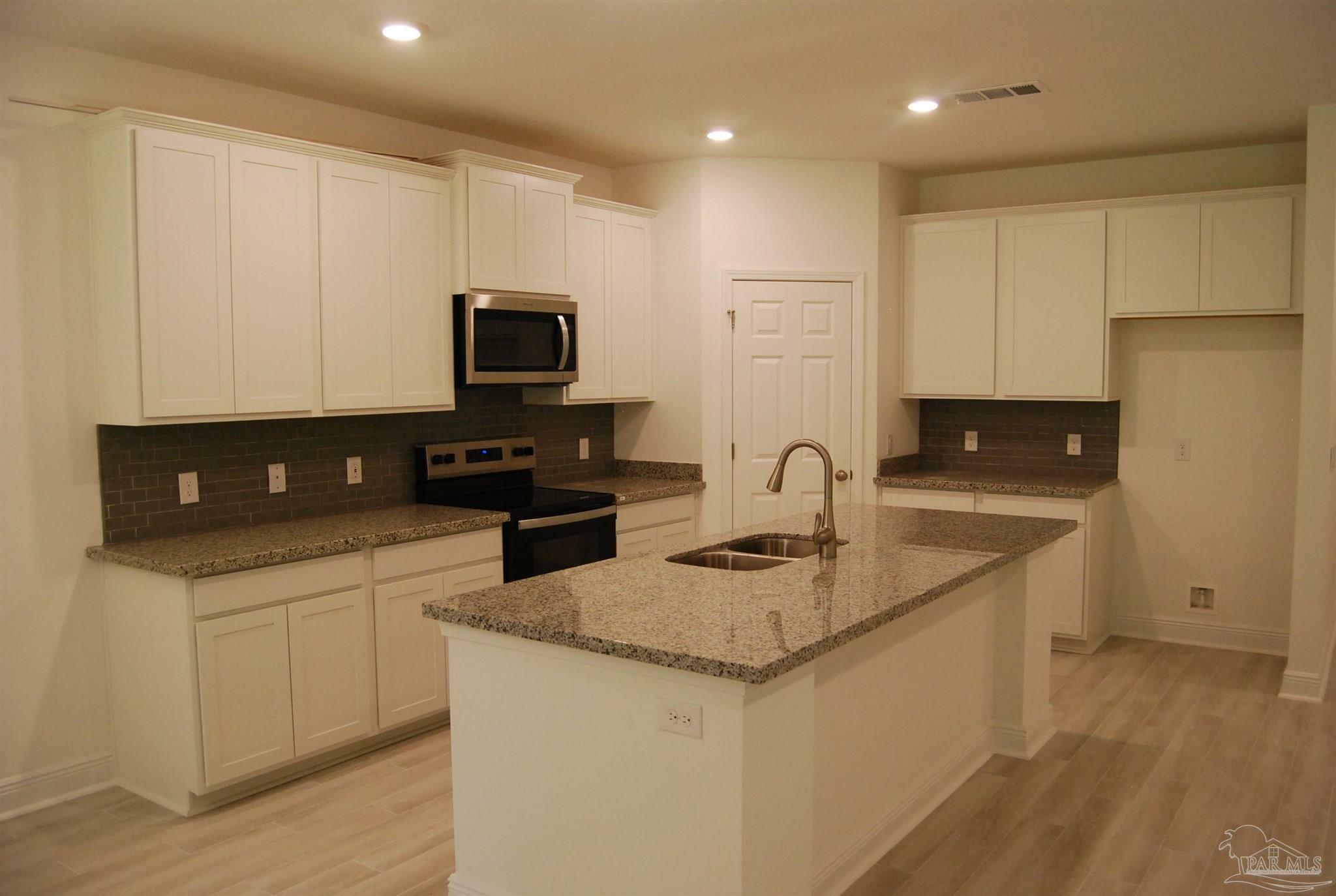 Property Photo:  7779 Piper Cir  FL 32583 