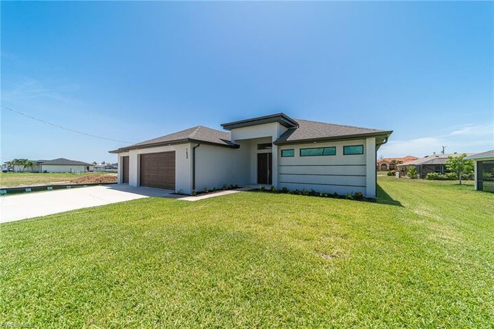 Property Photo:  1644 NW 37th Ave  FL 33993 
