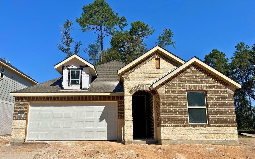 Property Photo: 202 Brecon Buff Drive TX 77318