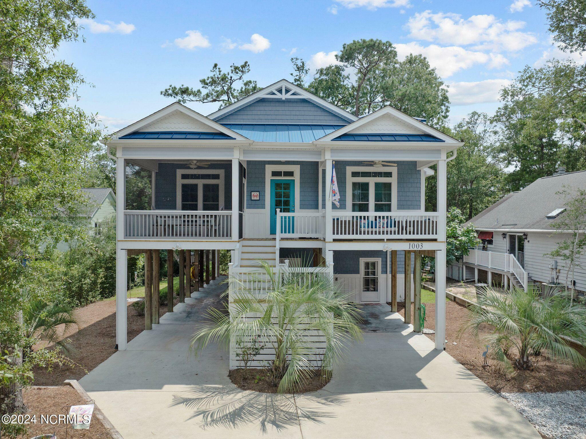 Property Photo:  1003 E Oak Island Drive  NC 28465 