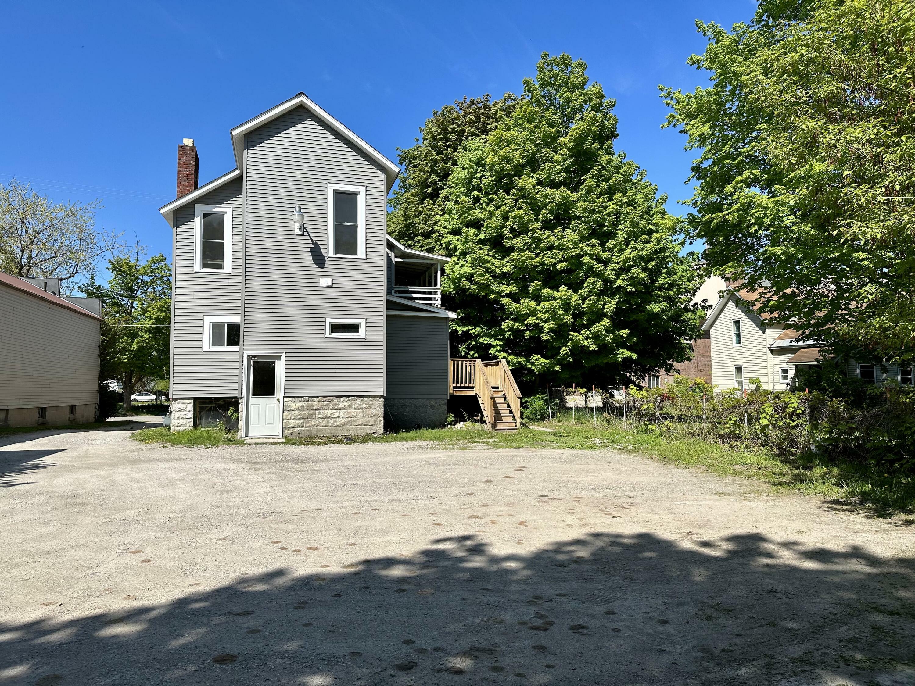 Property Photo:  225 Backus Street  MI 49721 