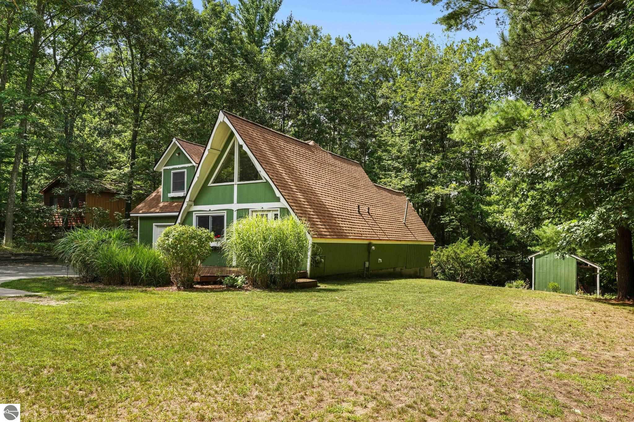 Property Photo:  1046 S South Long Lake Road  MI 49643 