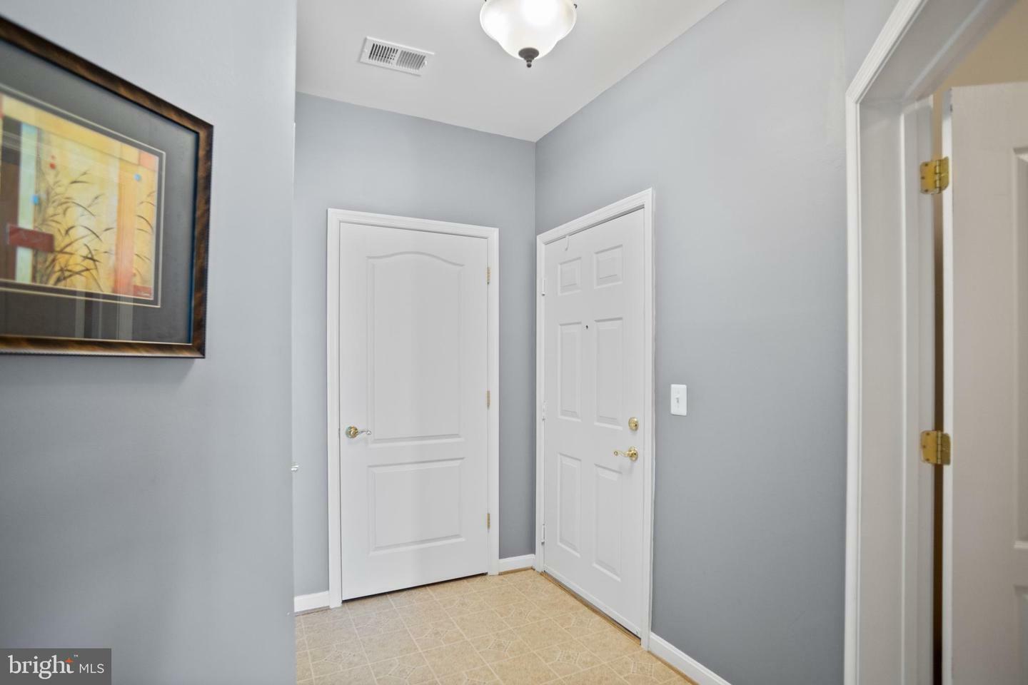 Property Photo:  8600 Roaming Ridge Way 206  MD 21113 