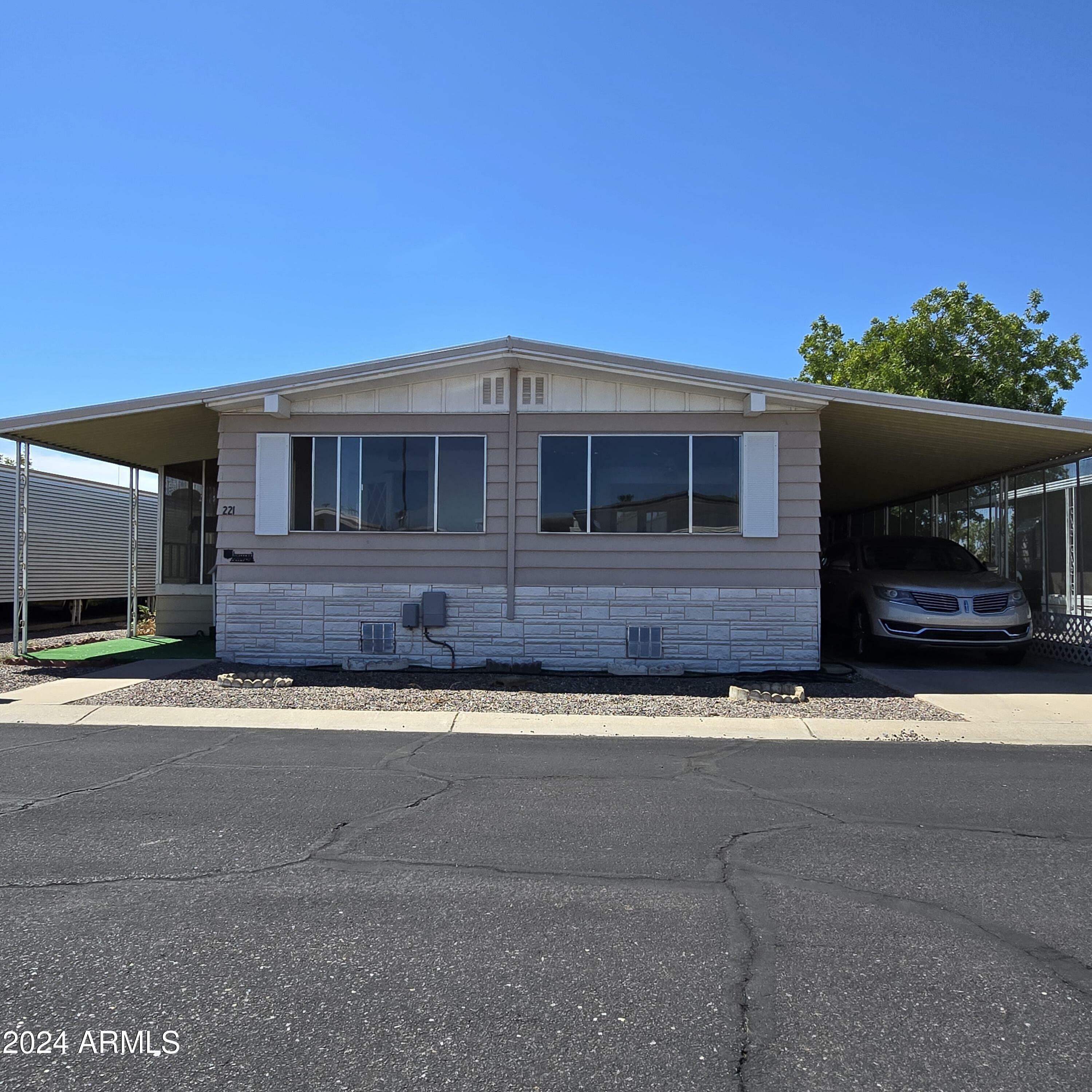 Property Photo:  11411 N 91st Avenue 221  AZ 85345 