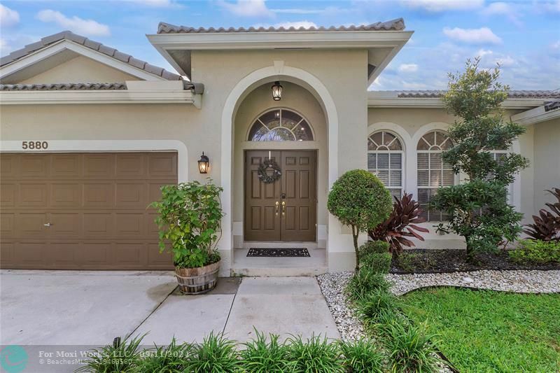 Property Photo:  5880 NW 40th Ln  FL 33073 