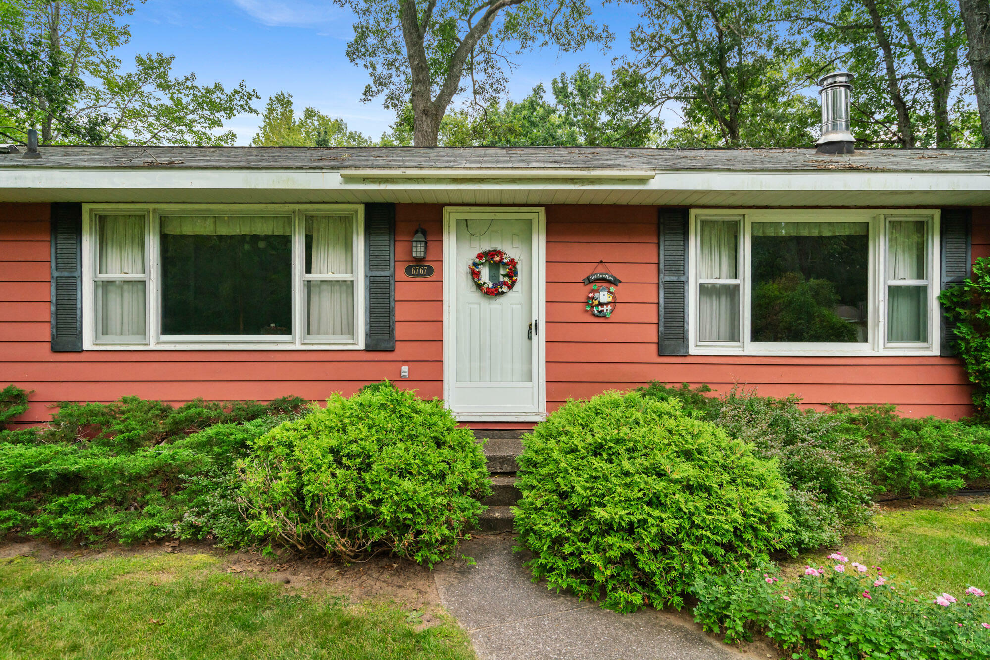 Property Photo:  6767 Louise Drive  MI 49749 