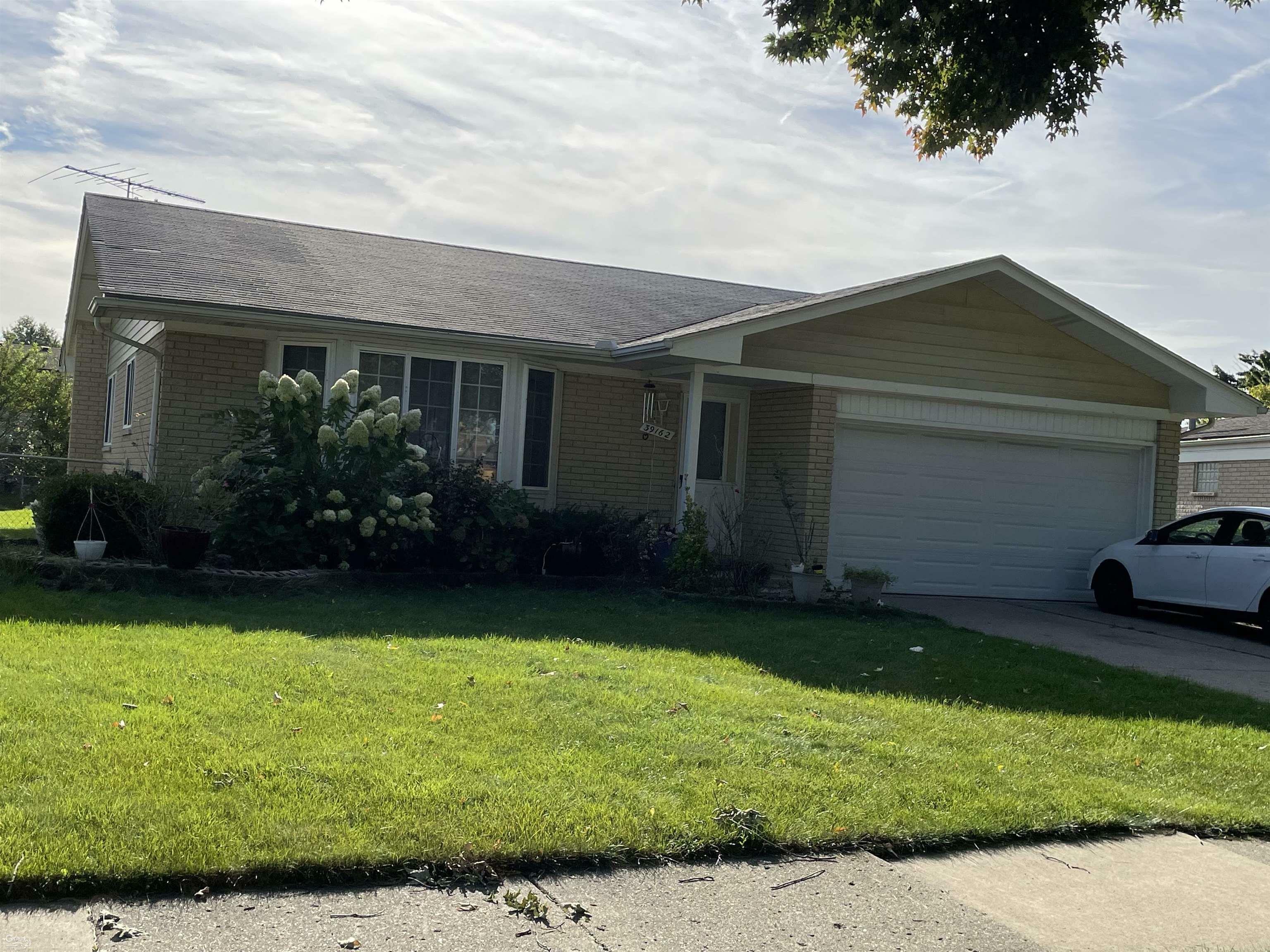 Property Photo:  39162 Faith Drive  MI 48310 