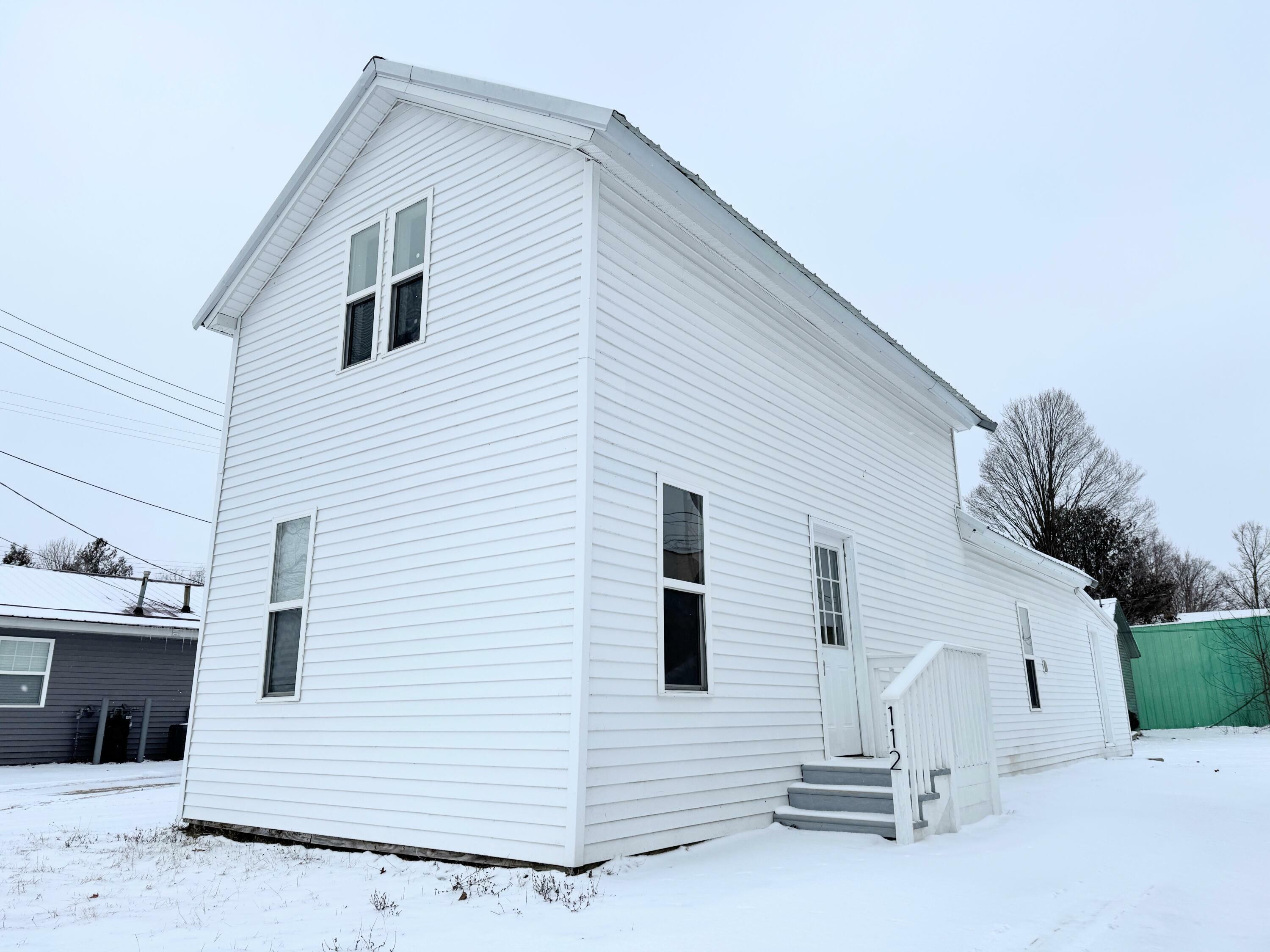 Property Photo:  112 W 6th Street  MI 49631 