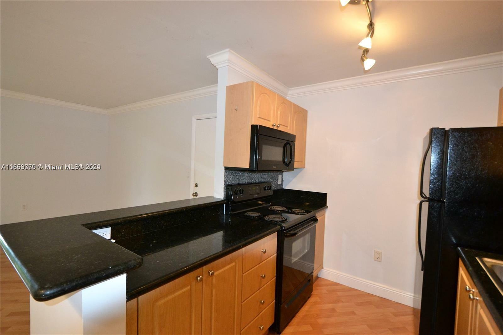 Property Photo:  10765 SW 108th Ave 304  FL 33176 