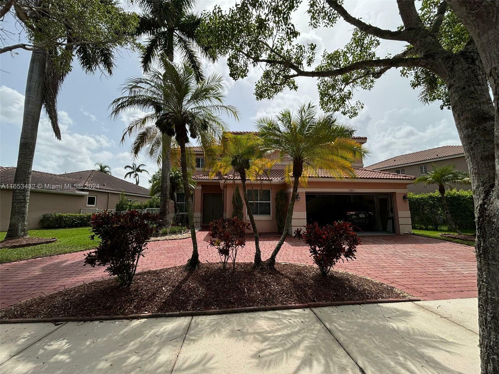 Property Photo:  1065 Nandina Drive  FL 33327 