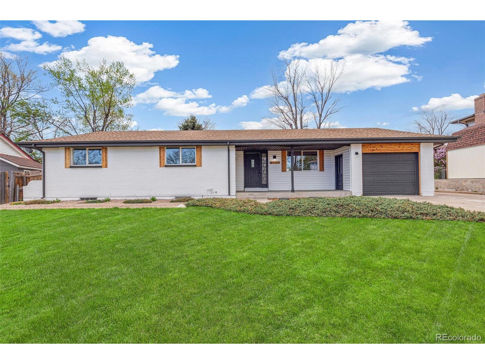 Property Photo: 8622 W Warren Ln CO 80227