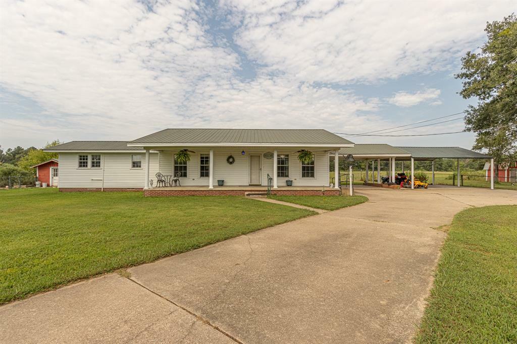 Property Photo:  8527 S Highway 59  TX 75672 