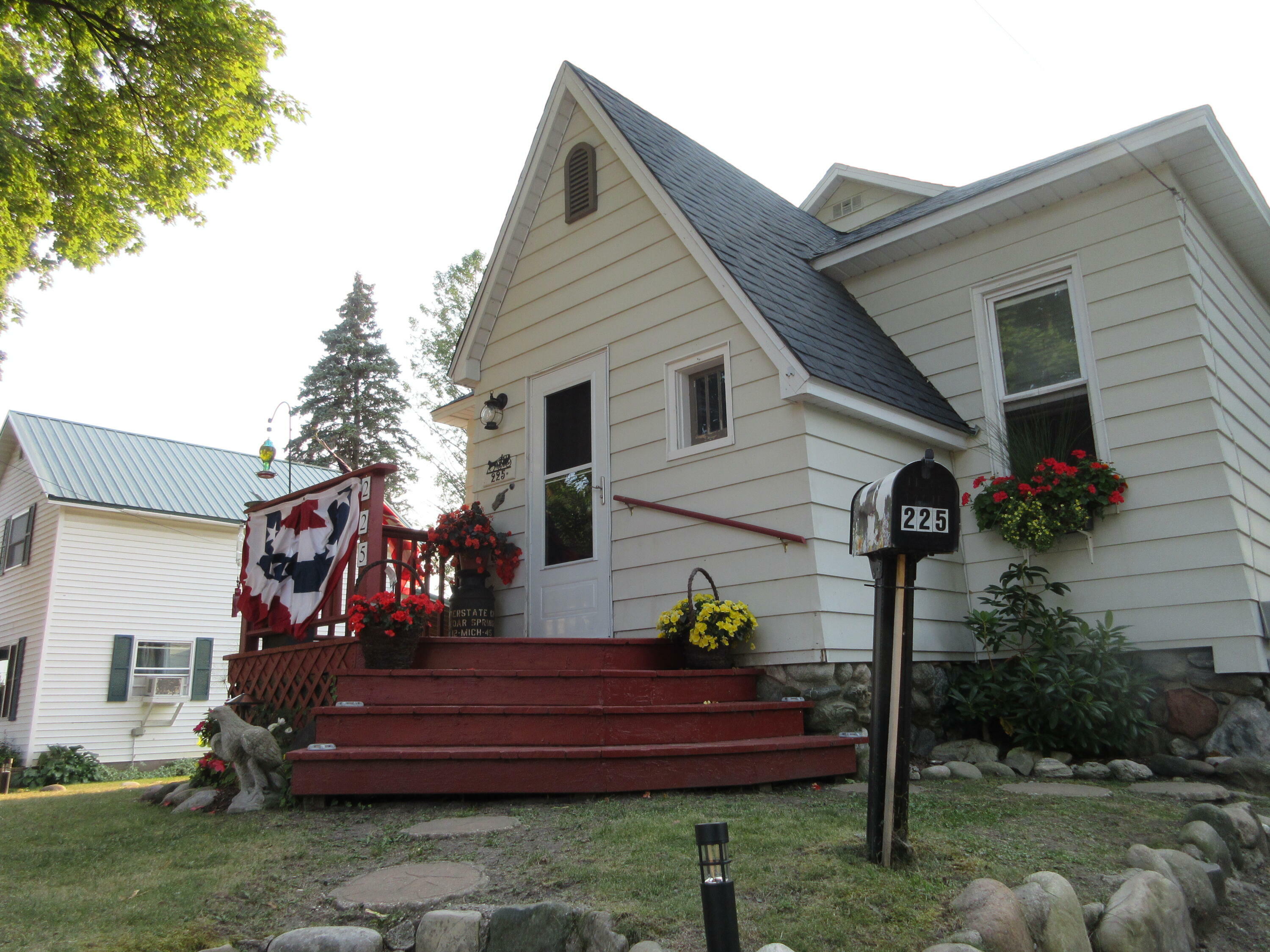 Property Photo:  225 N Ball Street  MI 49721 