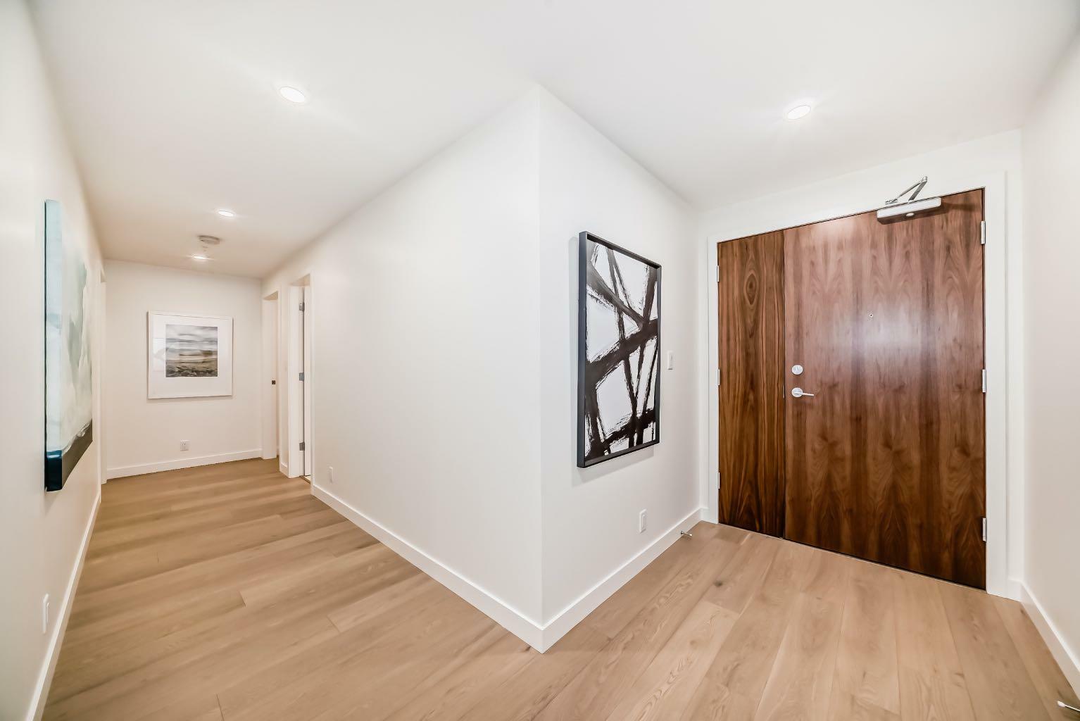 Property Photo:  88 Waterfront Mews SW 202  AB T2P 1K7 