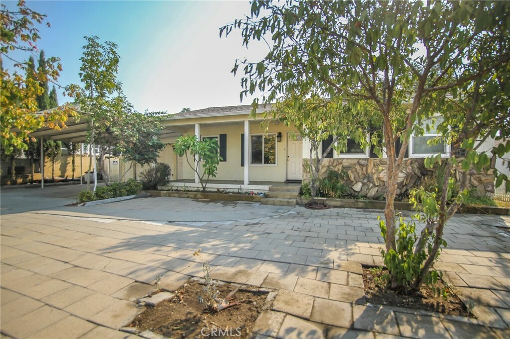 Property Photo:  8767 Alder Avenue  CA 92335 