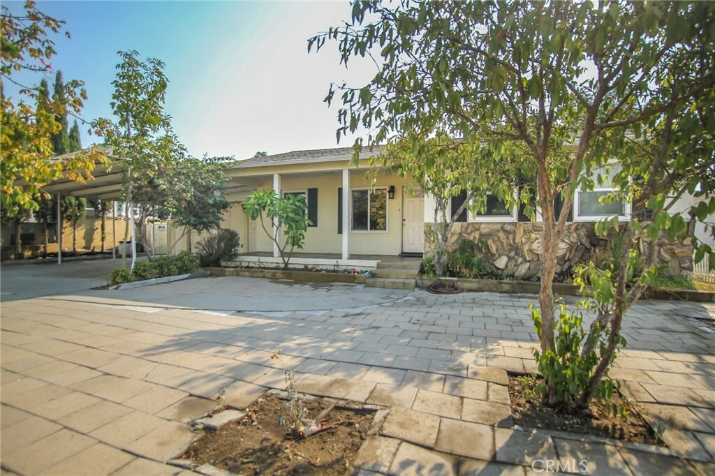 Property Photo:  8767 Alder Avenue  CA 92335 