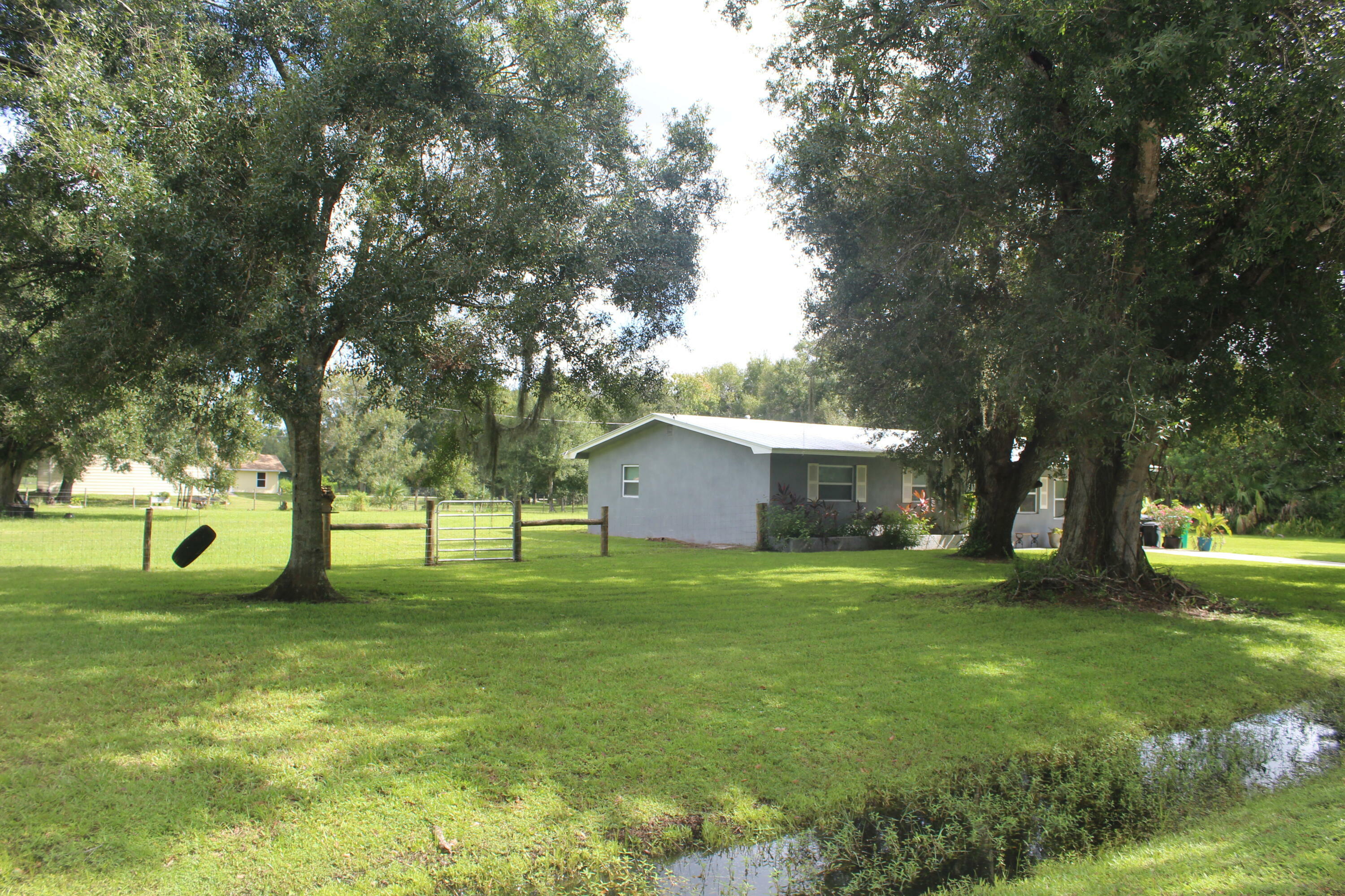 Property Photo:  7683 NW 87th Court  FL 34972 