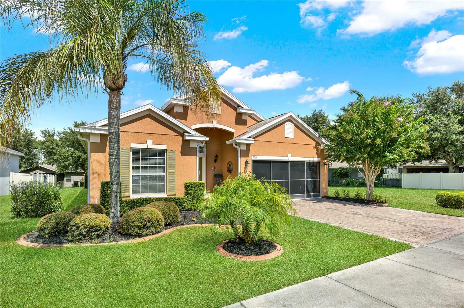 Property Photo:  5911 Whisper Pine Drive  FL 34748 