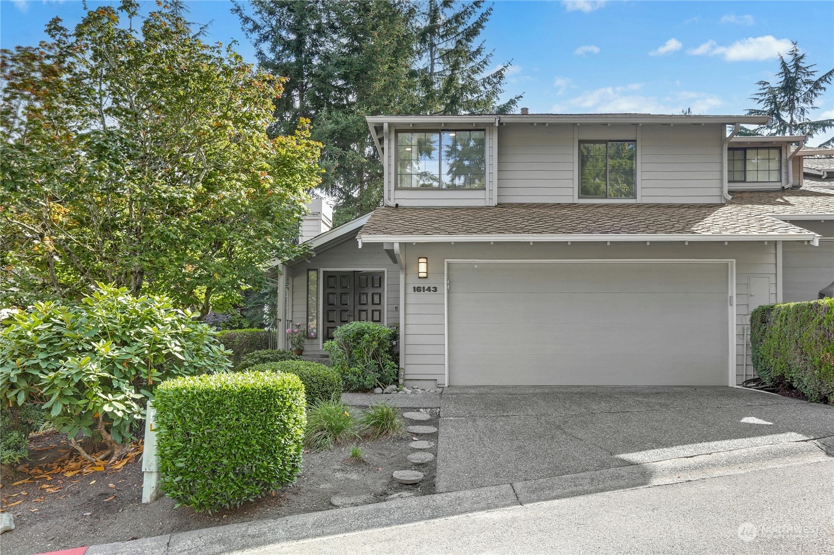 Property Photo:  16143 SE 33rd Circle 401  WA 98008 