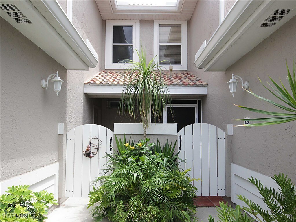 Property Photo:  402 Emerald Bay Circle E5  FL 34110 