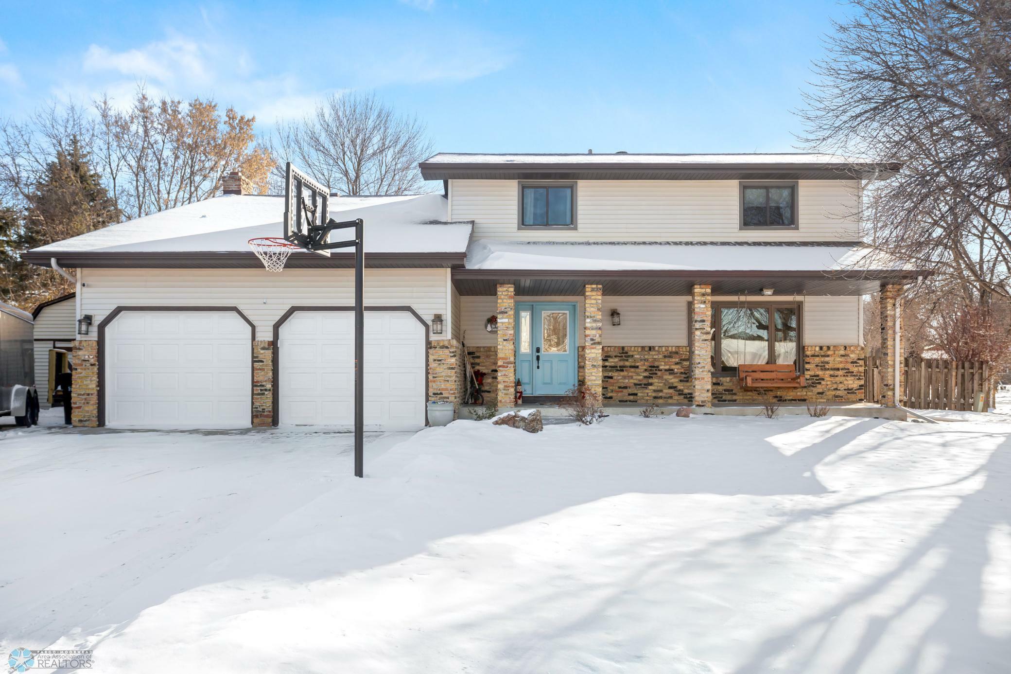 Property Photo: 229 Prairiewood Drive S ND 58103