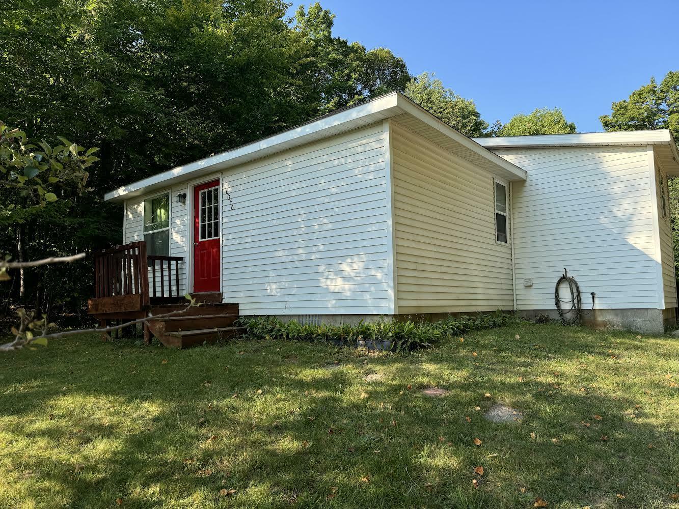 Property Photo:  6046 Reams Road  MI 49706 