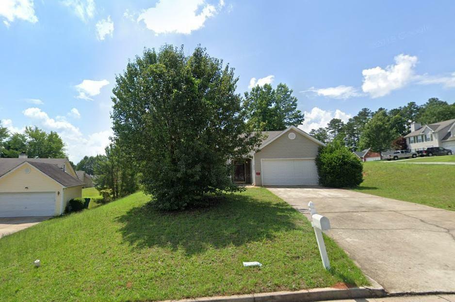 Property Photo:  10119 Commons Way  GA 30238 