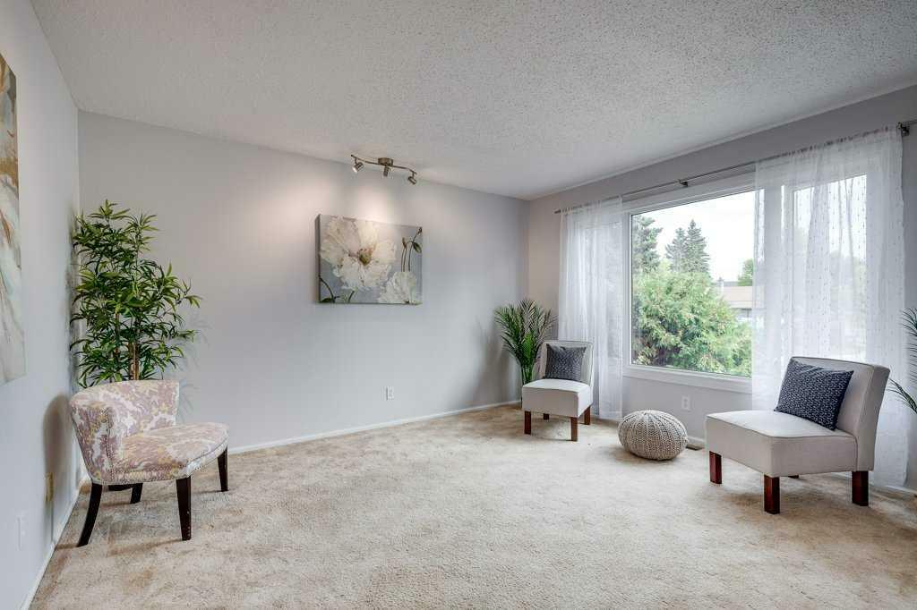 Property Photo:  5933 68 Street Close  AB T4P 1K2 