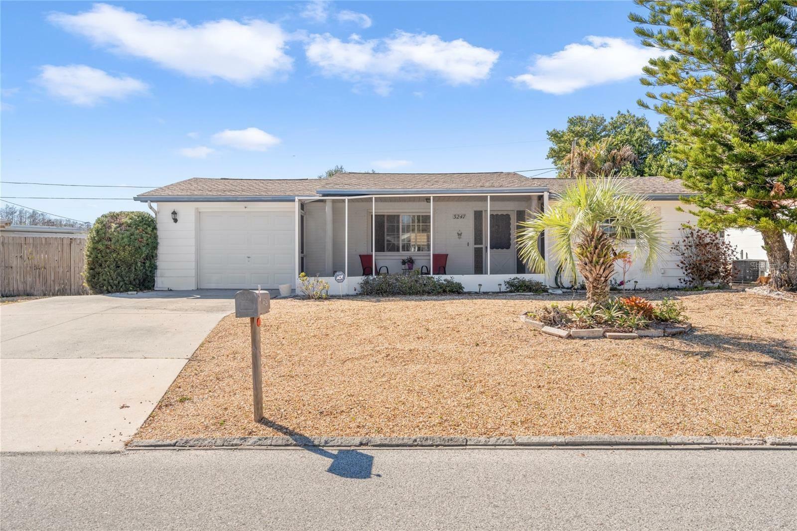 Property Photo:  3247 Kimberly Oaks Drive  FL 34691 