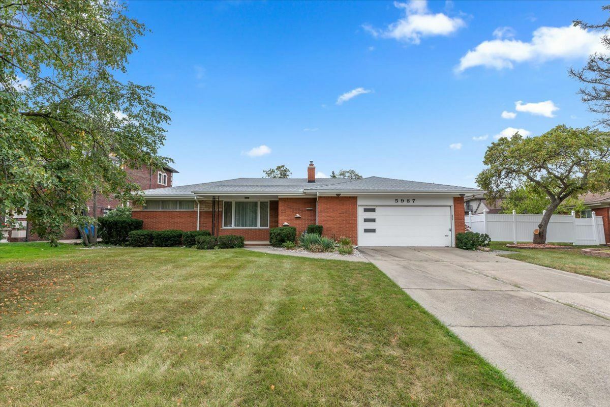 Property Photo:  5987 Campus Drive  MI 48127 2549 