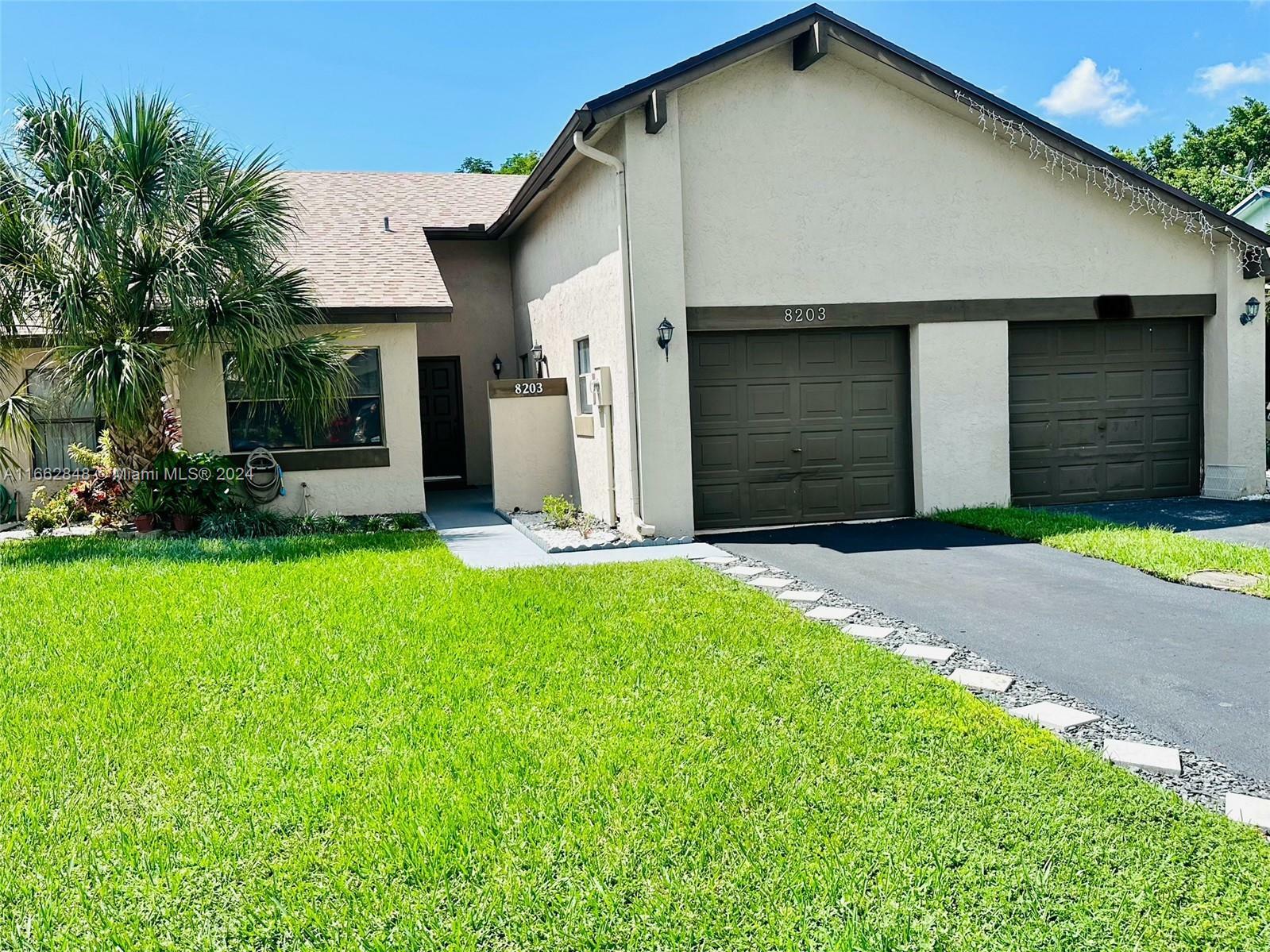 Property Photo:  8203 NW 100th Dr #8202  FL 33321 