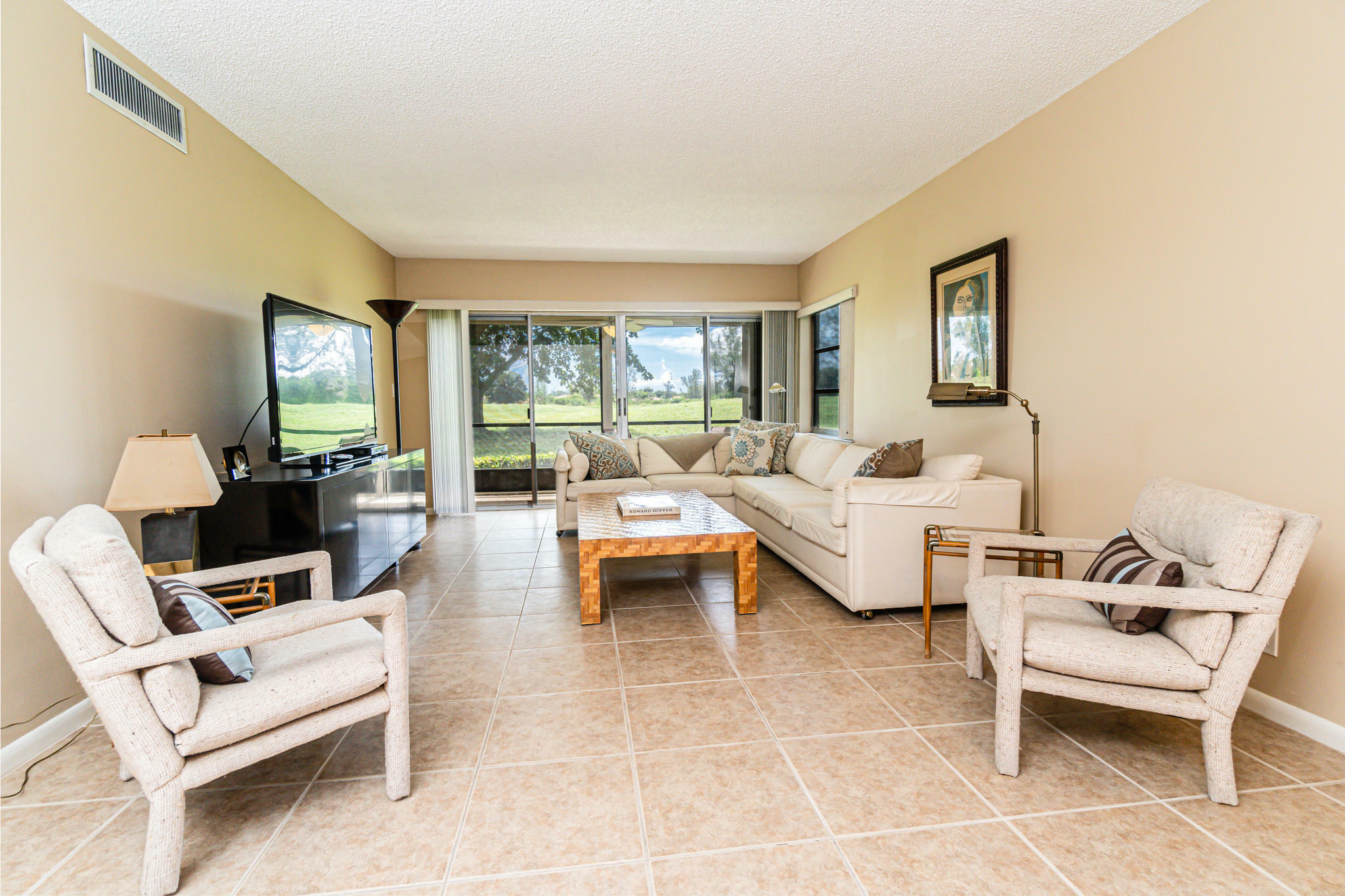 Property Photo:  5780 Princess Palm Court Apt. C  FL 33484 