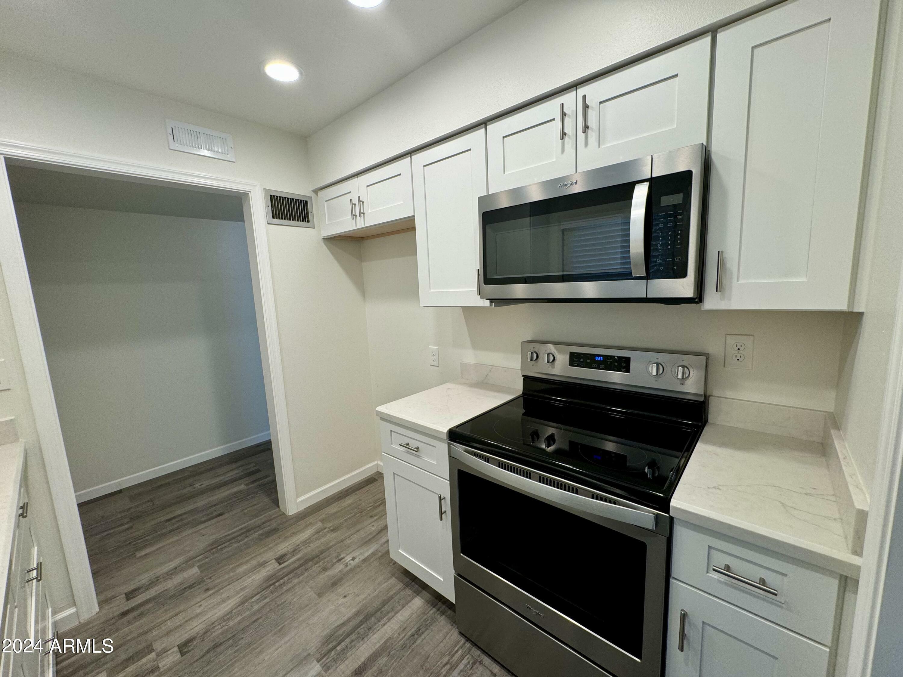 Property Photo:  13702 N 98th Avenue D  AZ 85351 