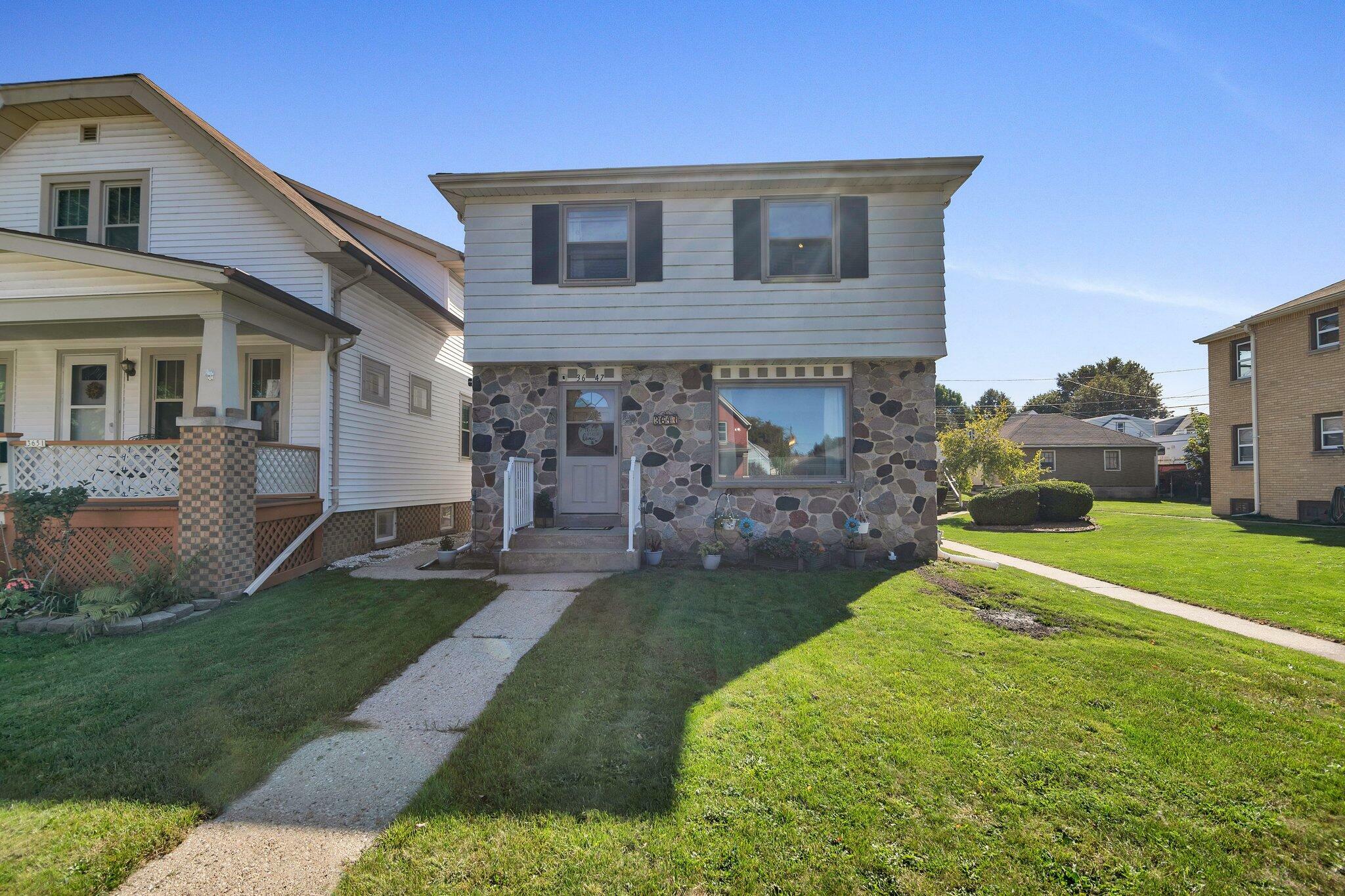 Property Photo:  3647 E Holmes Ave  WI 53110 