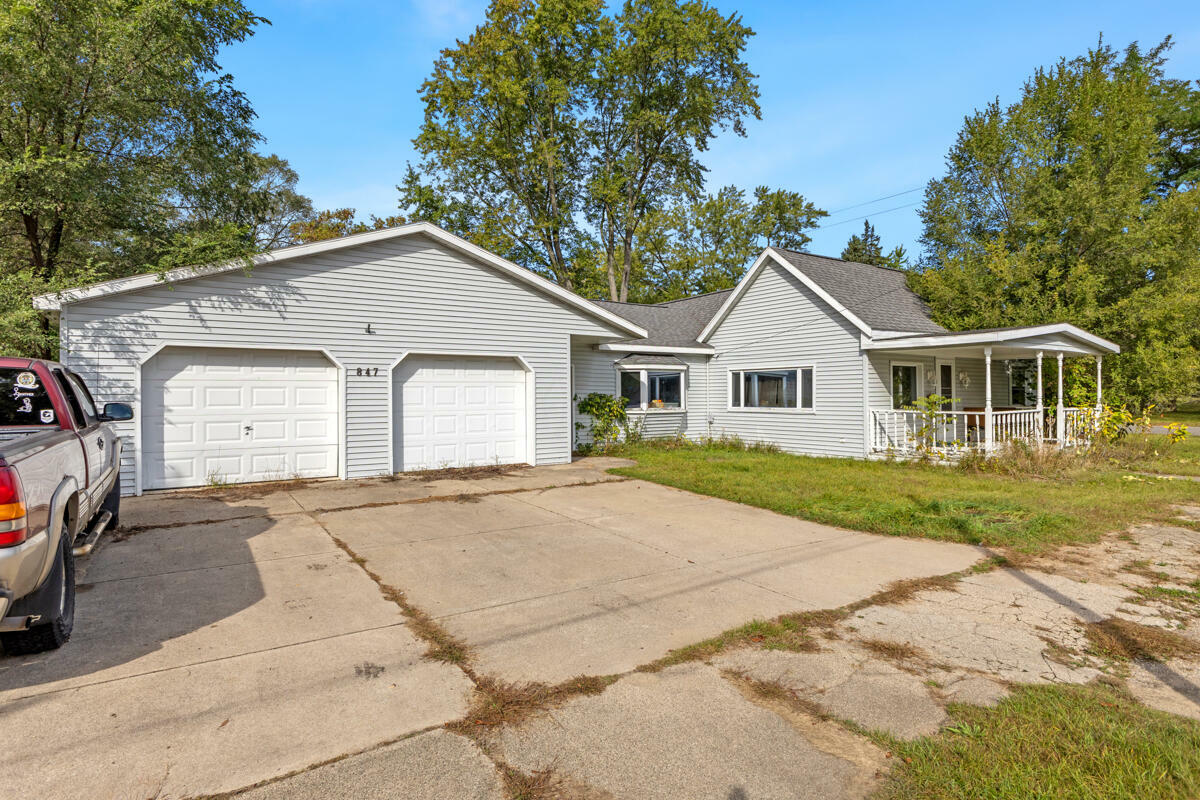 Property Photo:  847 N Hemlock Street  MI 49631 