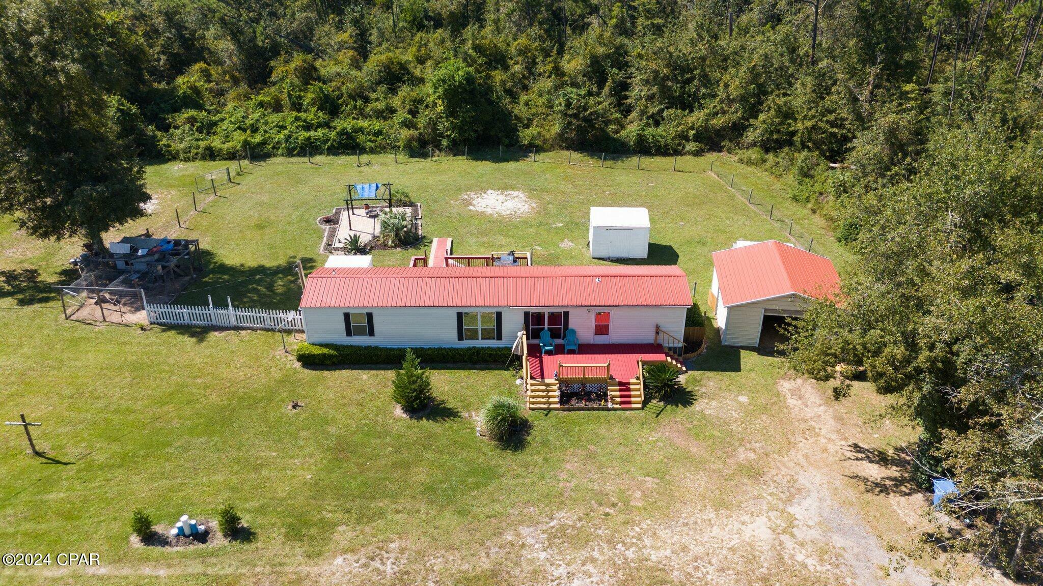 Property Photo:  17233 Highway 231  FL 32438 