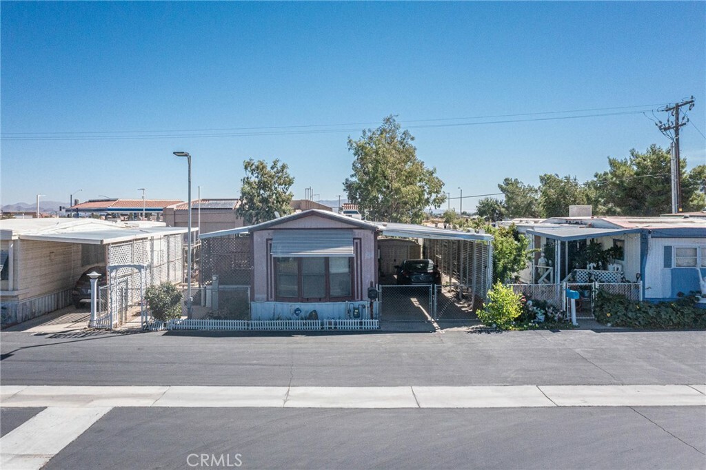 Property Photo:  14411 Palmdale Road 60  CA 92392 