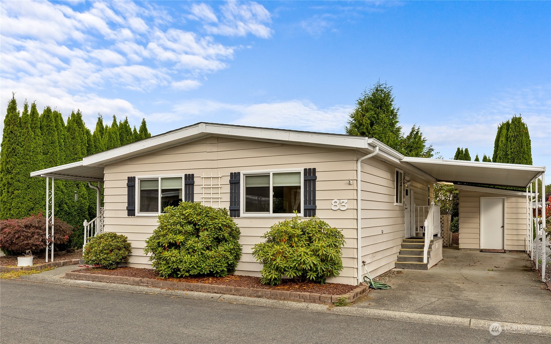 Property Photo:  1402 22nd Street NE 83  WA 98002 