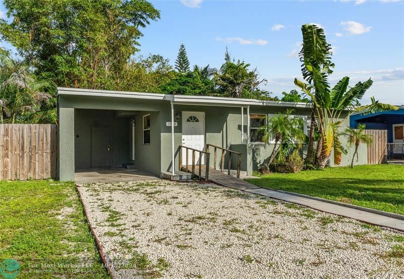 Property Photo:  1112 NW 15th Ave  FL 33311 