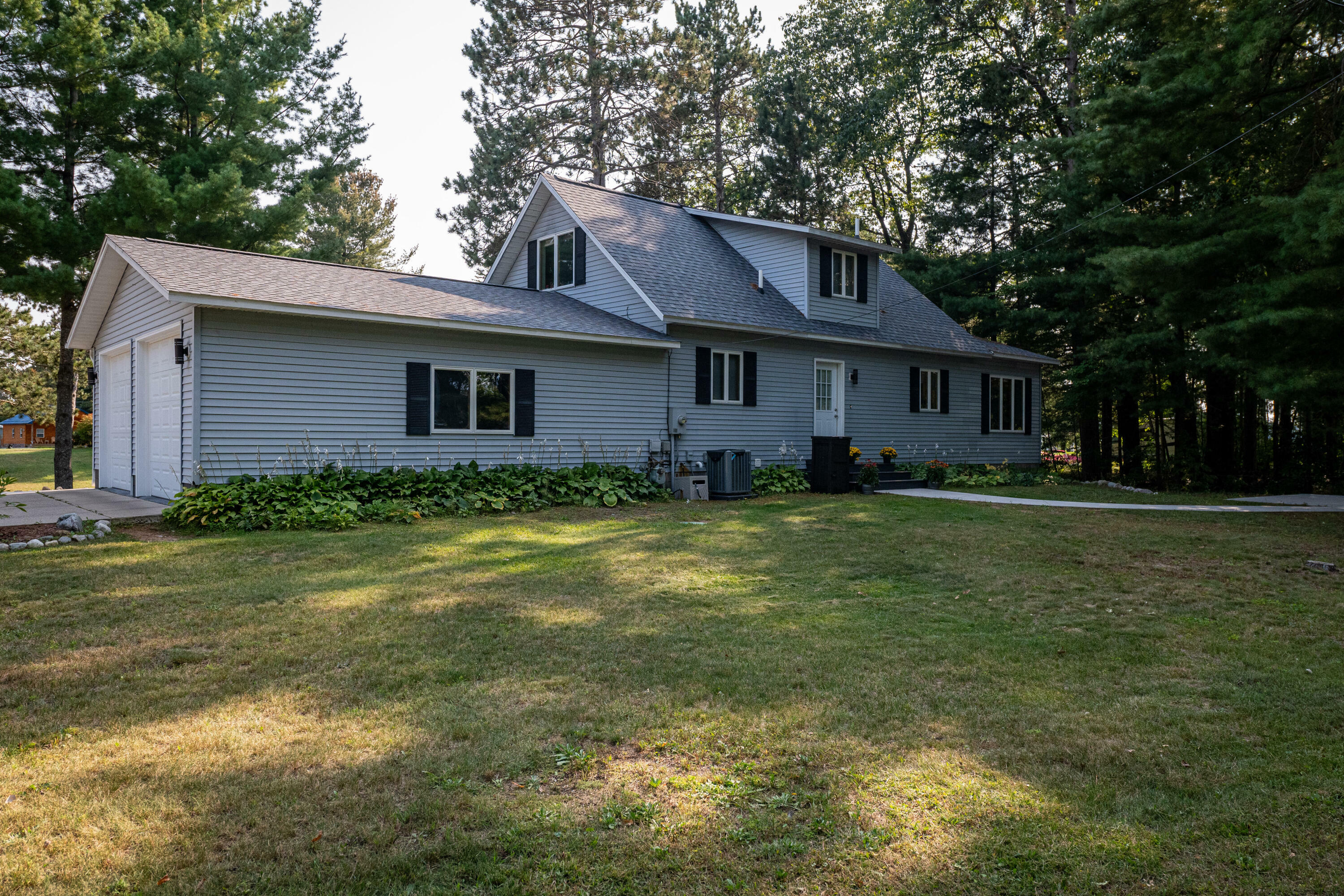 Property Photo:  813 N Tall Tree Lane  MI 49735 