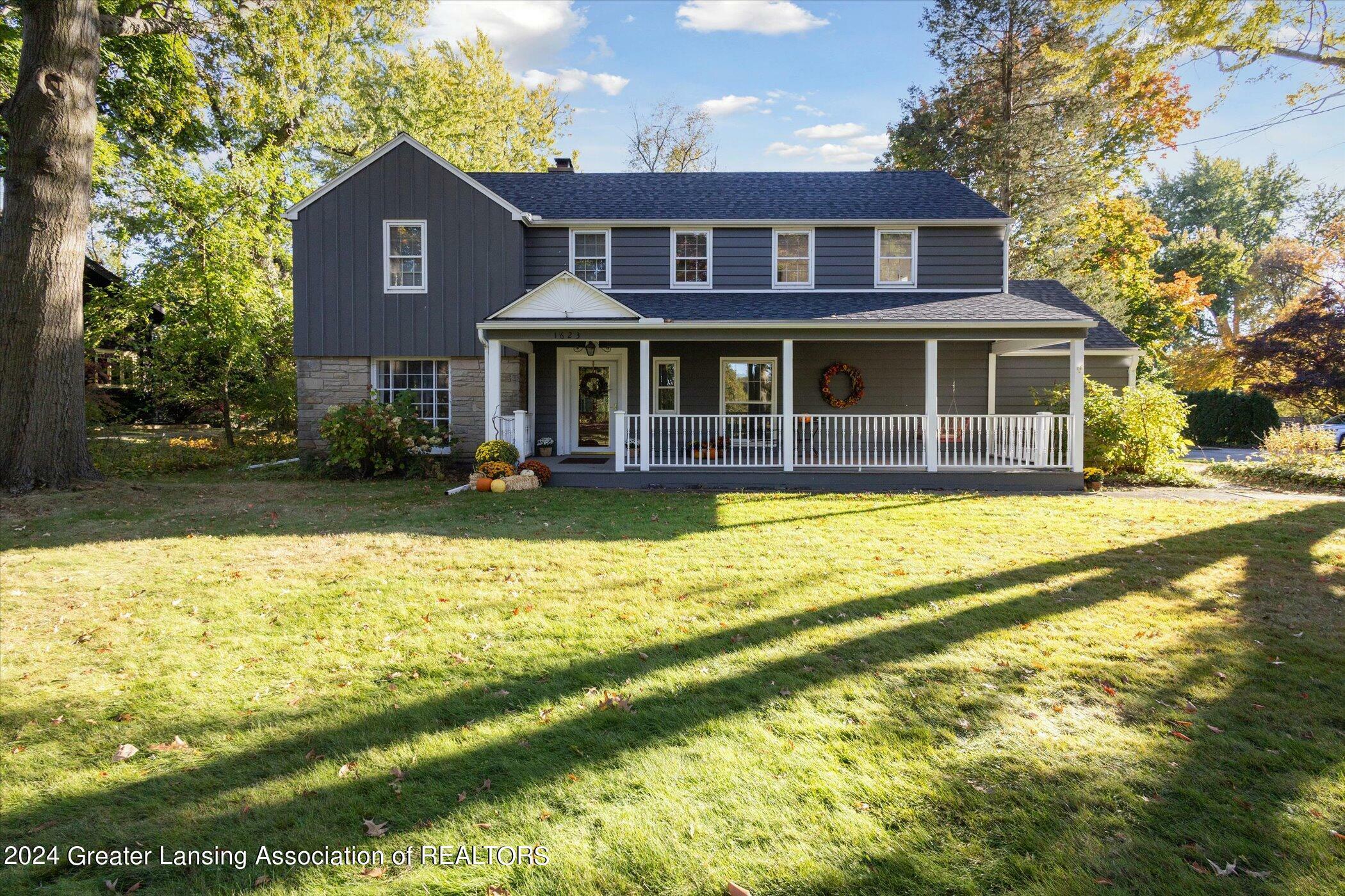 Property Photo:  1623 Moores River Drive  MI 48910 