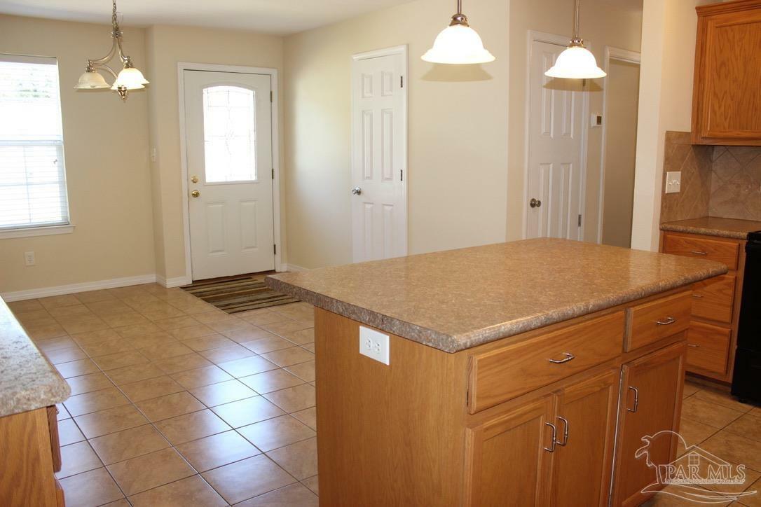 Property Photo:  7045 Santa Barbara St  FL 32526 