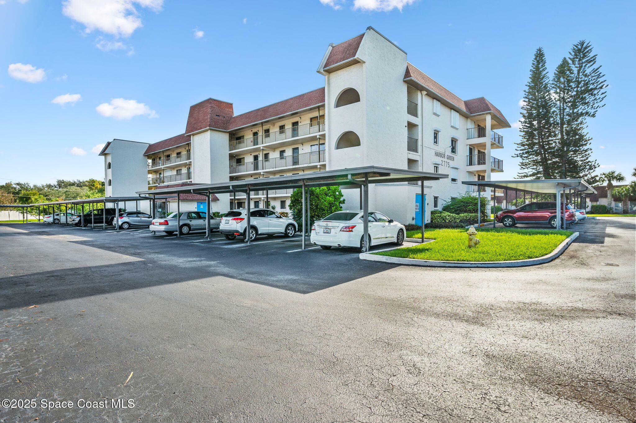 Property Photo:  2775 N Wickham Road  FL 32935 