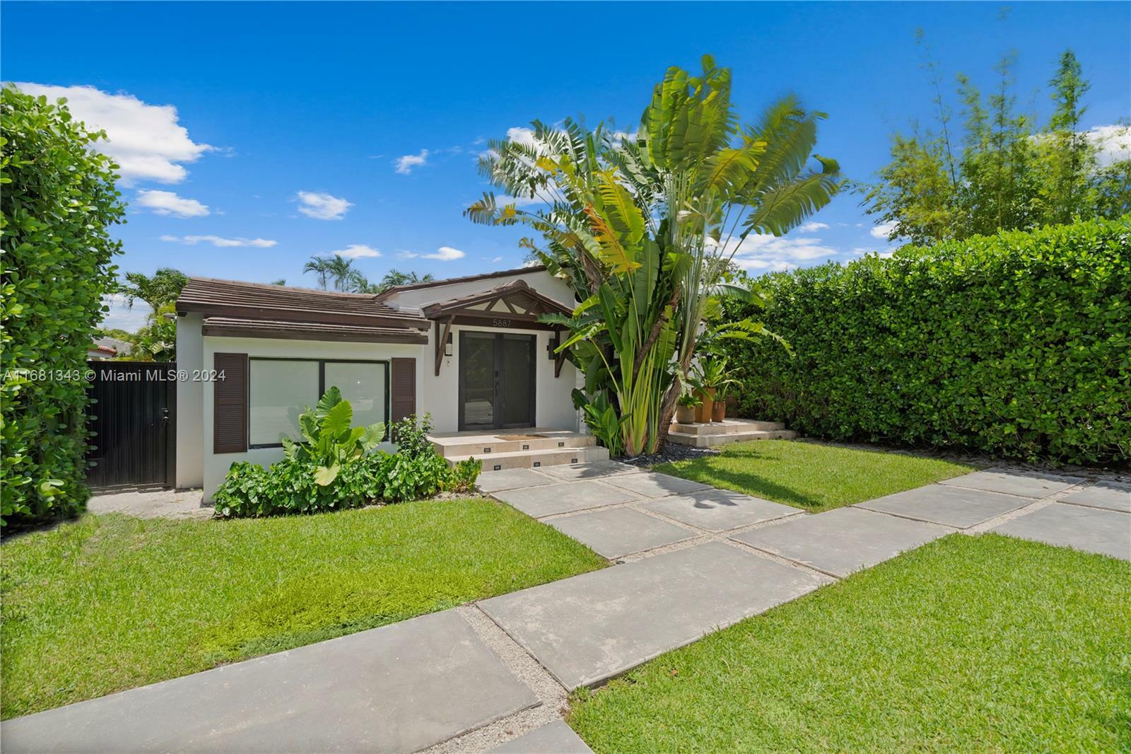 Property Photo:  5887 SW 28th St  FL 33155 